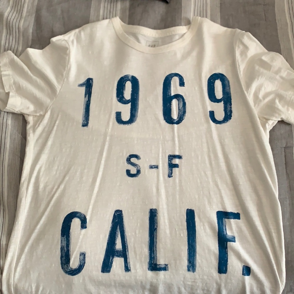 White GAP t-shirt with blue lettering. Size L